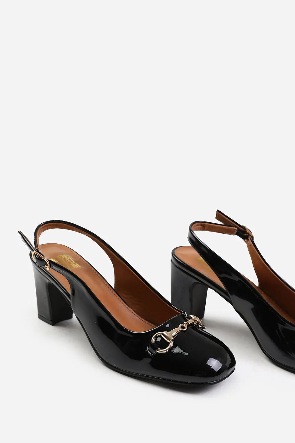 RAIZEL BLOCK HEEL WITH METAL DETAIL AND SLINGBACK BUCKLE STRAP IN BLACK PATENT